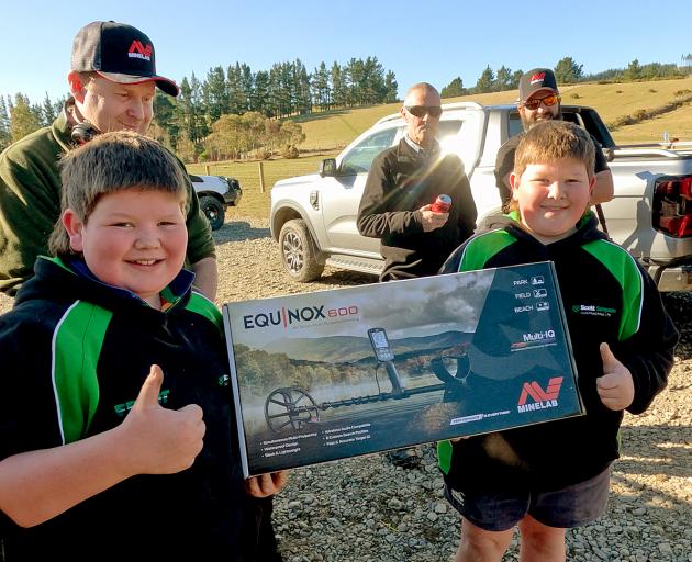 The national event's major prize winner donated his top-of-the-line metal detector to two junior...