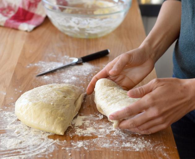 Nadia Lim makes pizza dough.