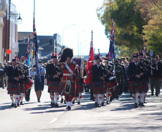 The North Otago Pipe Band leads the Anzac Day parade in Oamaru yesterday. PHOTO: KAYLA HODGE