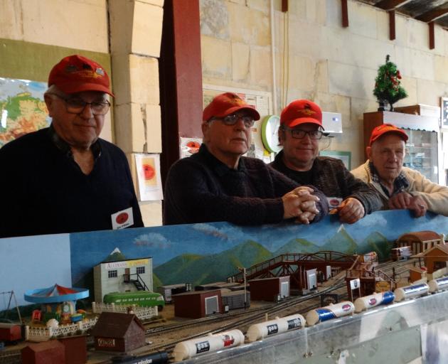 Whitestone Model Rail Group (from left) member Eric O’Brien, president Warren Crawford, members...