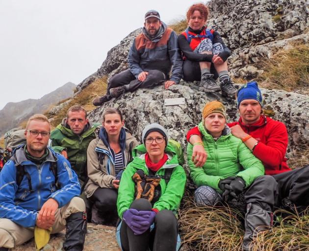 Surrounding the newly installed plaque to Czech tramper Ondrej Petr, by the Routeburn Track on...