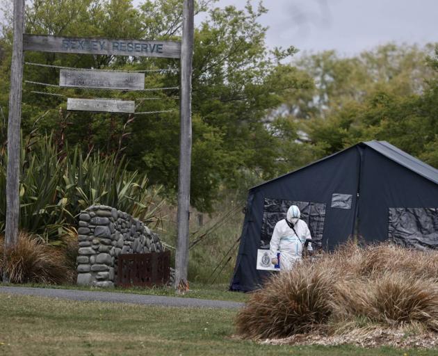 Police forensics team have erected a tent at the scene of the assault. Photo: George Heard