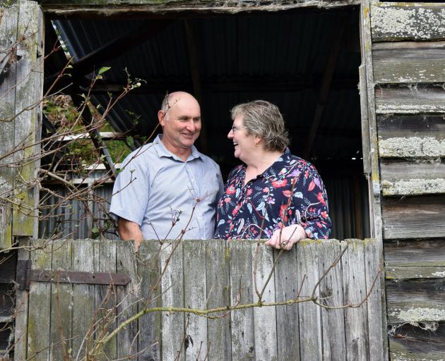 Blair and Valerie Smollett share a joke in an old barn on Glenesk sheep and beef farm. PHOTO:...