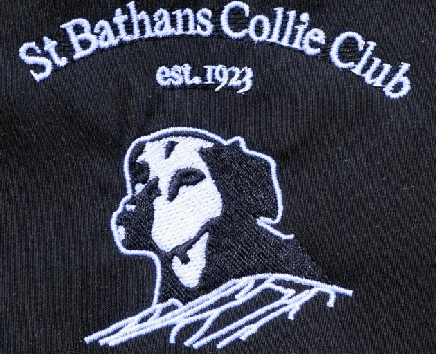 An emblem on a merino jersey to commemorate the St Bathans Collie Club centennial trial.