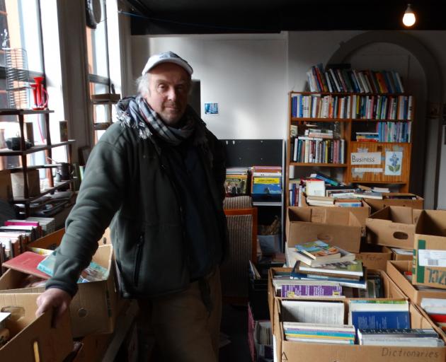 Stafford St bookseller Richard West has the mammoth task of selling or re-homing about 20,000...