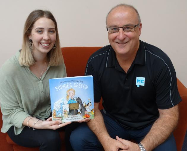 Dunedin-based author Craig McGregor (right) and illustrator Caitlin Jack admire their new...