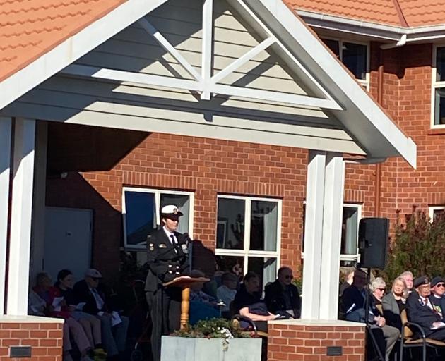 Petty Officer Bianca Lestuzzi, of the Royal Australian Navy, gives the Anzac address during the...