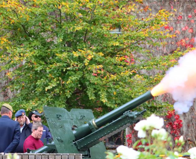 A two-gun salute marks the beginning of the University Of Otago Student Association Anzac Day...
