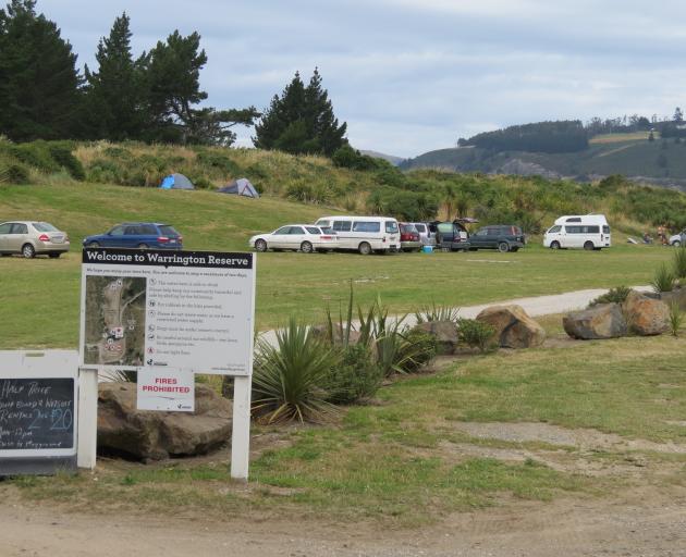 Freedom campers set up camp in the early afternoon at Warrington Reserve. PHOTO: BRENDA HARWOOD