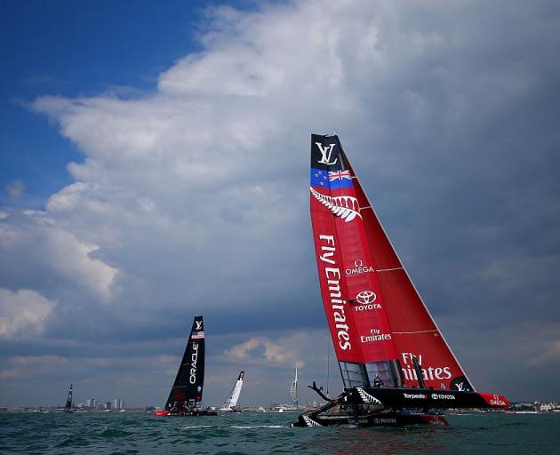 Team New Zealand competes in the America's Cup World Series, with Oracle in the background in...