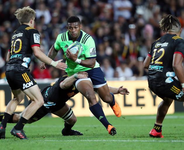 Waisake Naholo makes a break during the round seven Super Rugby match between the Chiefs and the Highlanders. Photo: Getty Images