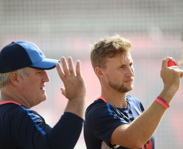 England spin coach Stuart MacGill and captain Joe Root at training. Photo: Getty Images