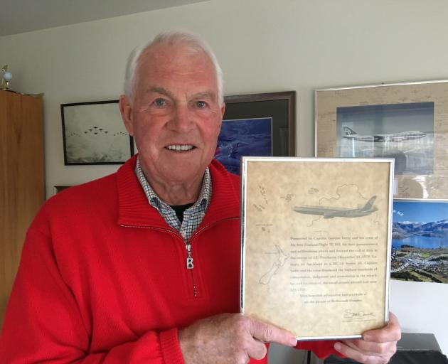 Arthur Dovey with the plaque he was presented with by McDonnell Douglas Corporation acknowledging...