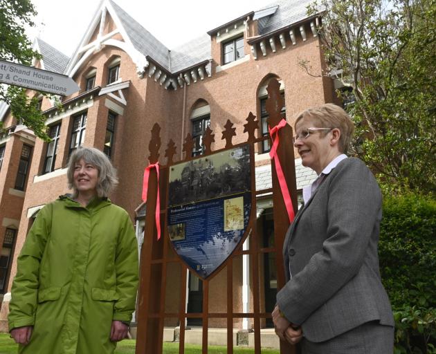 Hocken Collections photograph curator Anna Petersen (left) and deputy vice-chancellor for...