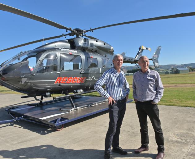 Ross Black (left), founder and chairman of the Otago Rescue Helicopter Trust,  with helicopter...