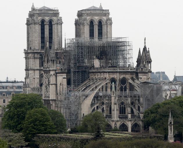 AFTER: A view shows Notre-Dame Cathedral after a massive fire devastated large parts of the...