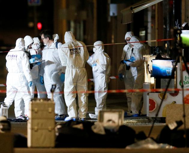 French police were hunting a suspected suitcase bomber on Friday after an explosion in the central city of Lyon that injured 13 people, officials said. Photo: Reuters