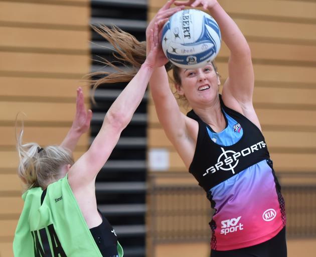 Kate Heffernan gets in front of Shannon Saunders to win the ball during a Southern Steel training...