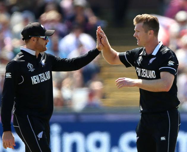 Jimmy Neesham celebrates taking a wicket against England. Photo: Getty Images