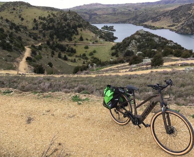 The mighty Scott electric bike from Trail Journeys takes a break at the top of a switchback...