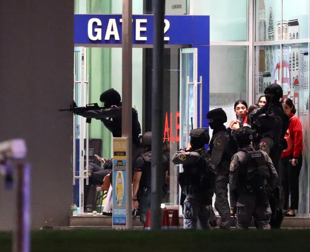 Thailand security forces enter in a shopping mall as they chase a shooter hidden in after a mass shooting in front of the Terminal 21, in Nakhon Ratchasima. Photo: Reuters