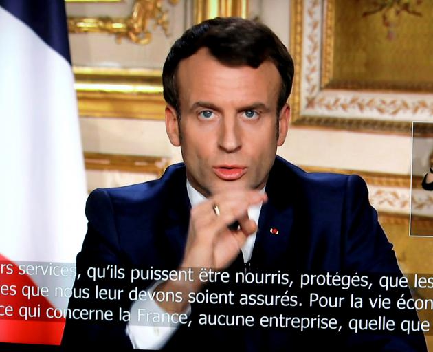 French President Emmanuel Macron is seen addresses the nation about the coronavirus disease (COVID-19) outbreak. Photo: Reuters