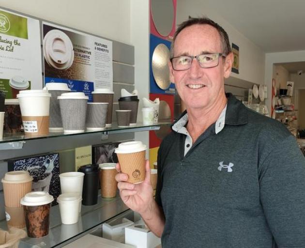 Glopac general manager Chris Thomson with one of the plastic-free coffee cups. Photo: RNZ / Anan...