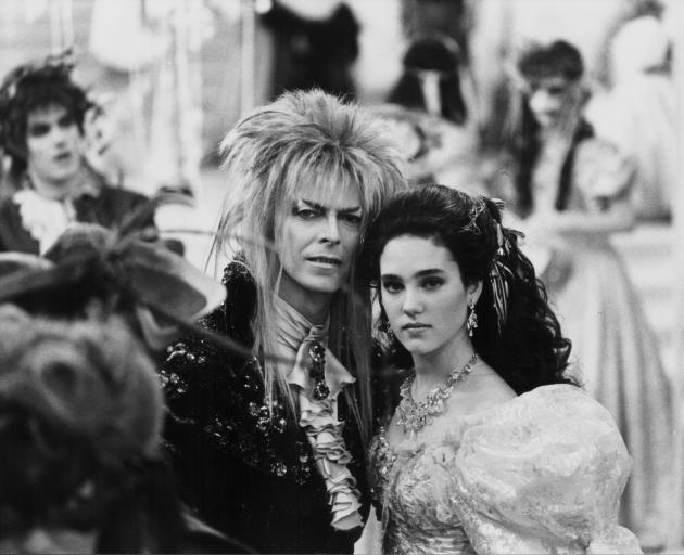 Stars align ... Actors David Bowie and Jennifer Connelly perform in a scene from the movie...
