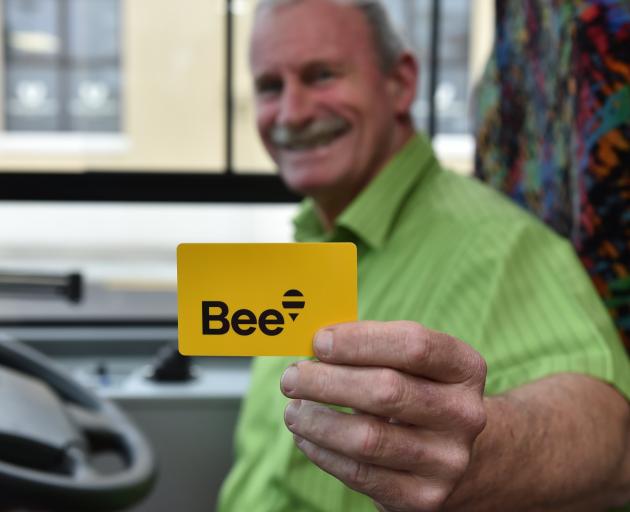 Go Bus driver Alan Savell shows off the new Bee Card in Dunedin’s bus hub, in Great King St,...