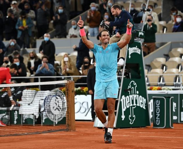 Rafael Nadal celebrates after claiming his 13th French Open title. Photo: Getty Images