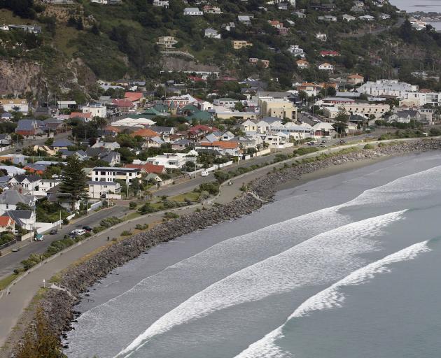 A report says coastal properties in suburbs like Sumner could face spiraling insurance premiums –...