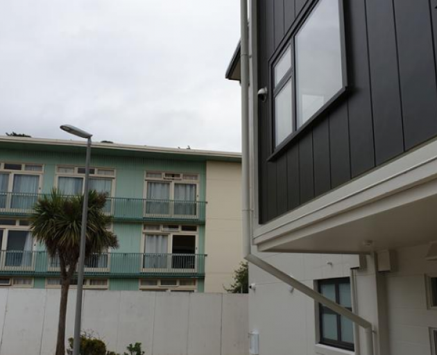 The old apartments still to be renovated on the left, while the newly refurbished block is on the...