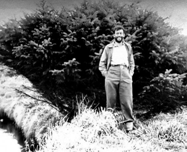 Robert Stanley stands in front of the spruce in the early 1950s. PHOTO: SUPPLIED