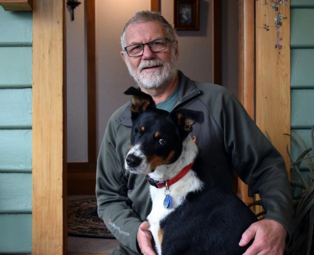 K9 Weed Detection owner John Taylor pats Border collie Wink. PHOTO: SHAWN MCAVINUE