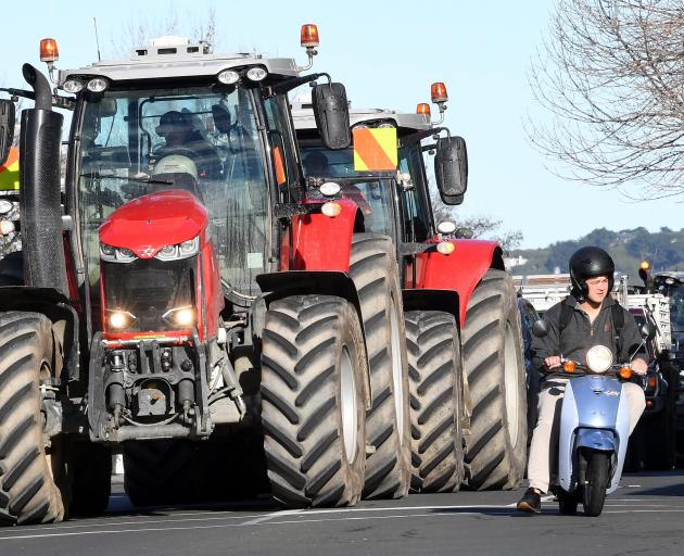 A convoy of tractors heads along Princes St in Dunedin yesterday as part of Groundswell NZ’s Howl...