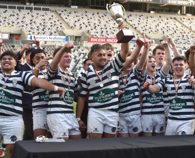 Otago Boyss players celebrate their win over Southland Boys' at Forsyth Barr stadium. Photo:...