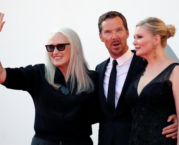 Director Jane Campion (left), Benedict Cumberbatch and Kirsten Dunst attend the red carpet event...