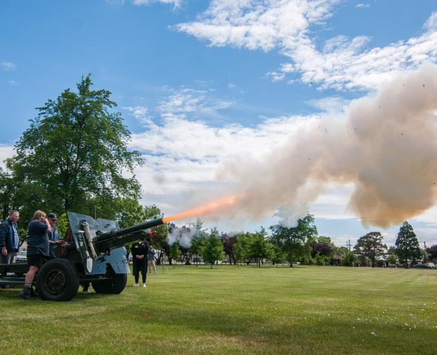 A QF 25-pounder gun fires one of three rounds as part of the Alexandra-Clyde RSA Armistice Day...