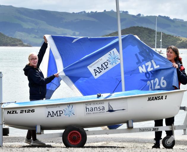 Showing off one of the new accessible boats at the Broad Bay Boating Club are club commodore Lynn...