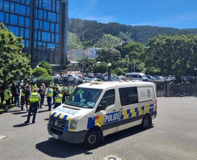 Police are moving to clear the roads outside and near Parliament as protesters continue to occupy...