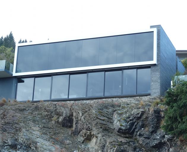 Queenstown Hill’s "Plasma House" has been sold to a company linked to Auckland property investor...