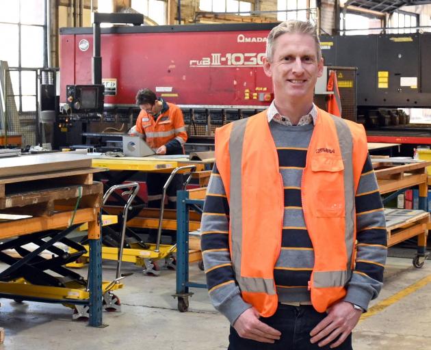 Farra Engineering chief executive Gareth Evans stands in the company’s workshop. PHOTO: LINDA...