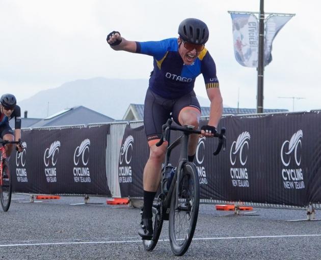 Otago rider James Gardner celebrates victory in the under-19 road race at the New Zealand age...