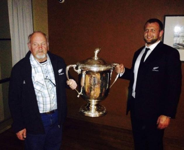 All Black Joe Moody with his Dad Tony Moody holding the Bledisloe Cup. Photo: Supplied