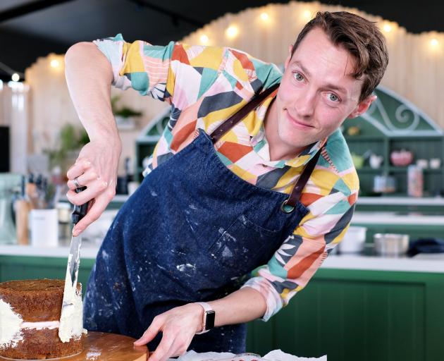 Alby Hailes ices a cake during The Great Kiwi Bake Off. Photo: supplied