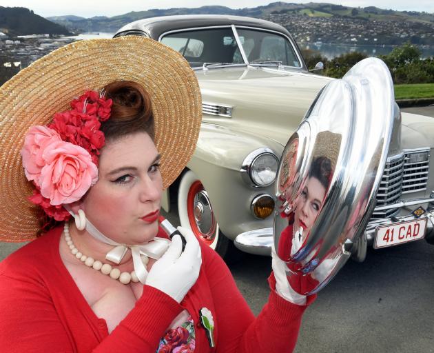 Dunedin Darlin’ pageant organiser Kerry-Lee Bray applies some lippy with a hub cap from Kevin...