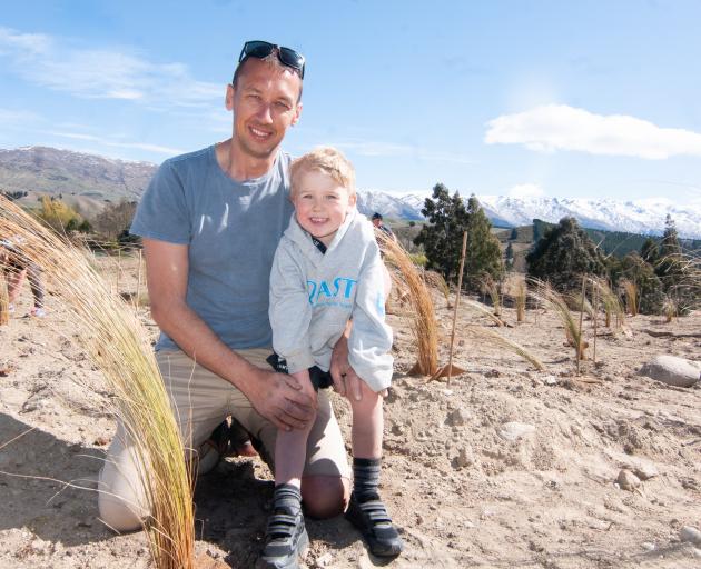 Lake Dunstan Charitable Trust chairman Duncan Faulkner and son Alfie (3) take part in the...