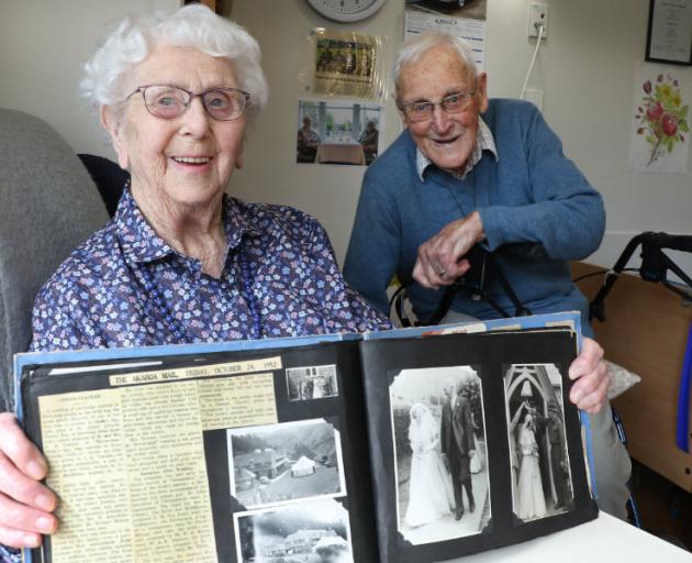 Rosemary and Bruce Childs, formally of Cheviot , with the newspaper article on their  wedding...