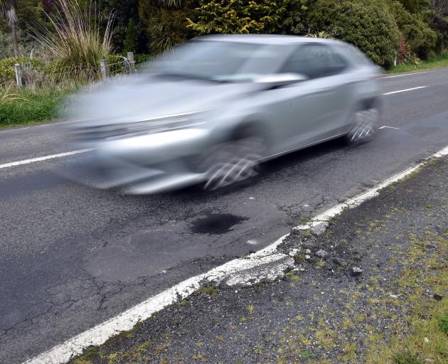 A pothole in Highcliff Rd yesterday morning. Photo: Gregor Richardson