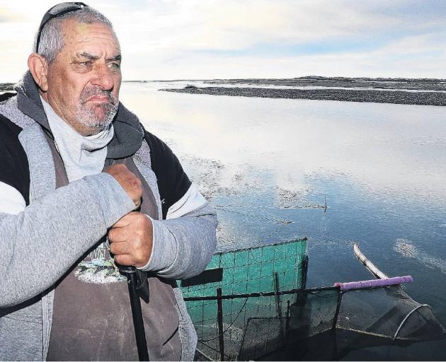 Dirty river . . . Graeme Rupene of Tuahiwi is angry and concerned about the state of the Ashley...